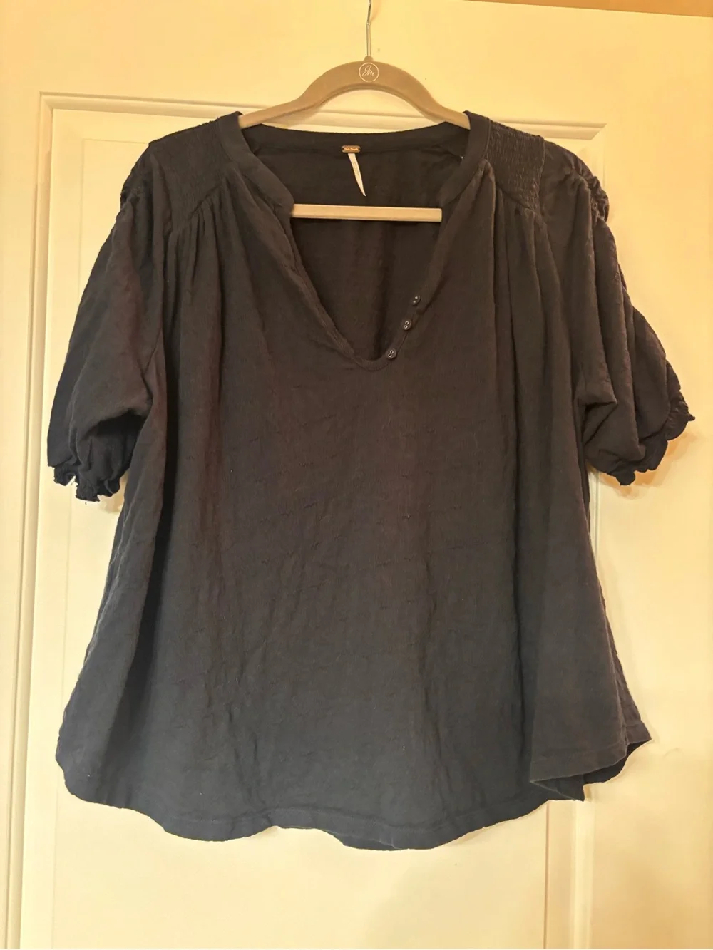 Like New. Free People Women's Washed Black V-Neck Puff Sleeve Top. Size Large.